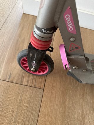 Patinete infantil rosa y gris