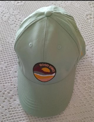 Riñonera y gorra McDonald's Coca-Cola Verde