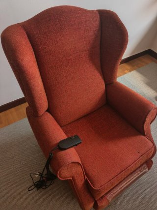 Sillón relax eléctrico tela naranja.