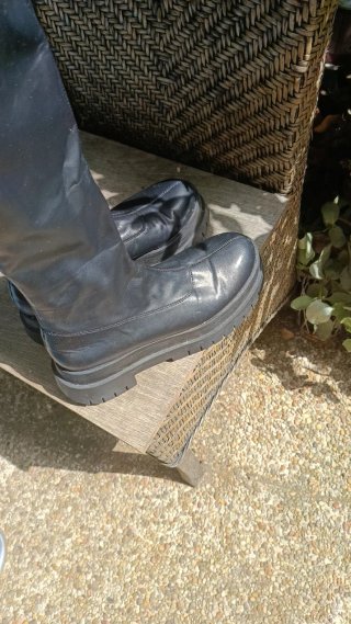 Botas altas negras con cremallera