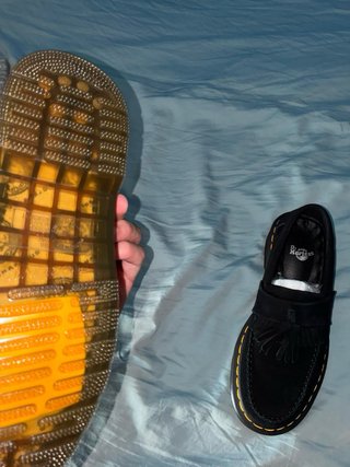Mocasines Dr Martens negros con flecos