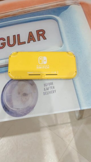 Nintendo Switch Lite Amarilla + FC26