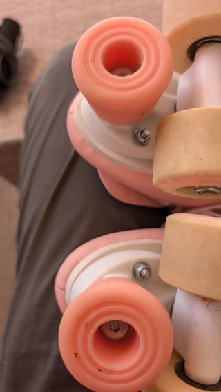 Patines rosas Oxelo talla 34 con su mochila