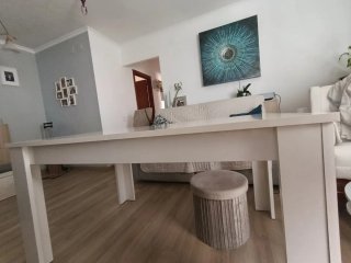 Mesa de comedor extensible de madera