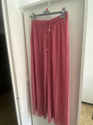 Pantalones anchos plisados rosa