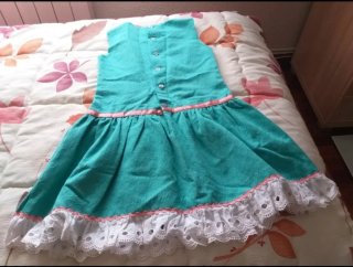 Vestido niña turquesa con lazo rosa