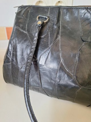 Bolso negro de piel patchwork