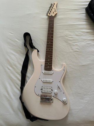 Guitarra eléctrica Cort G200 SP, funda accesorios
