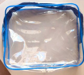 Neceser transparente azul y blanco