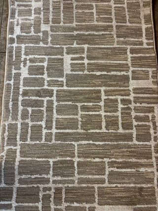 Tappeto nuovo beige/panna ancora imballato