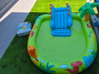 Piscina hinchable dinosaurio con tobogán