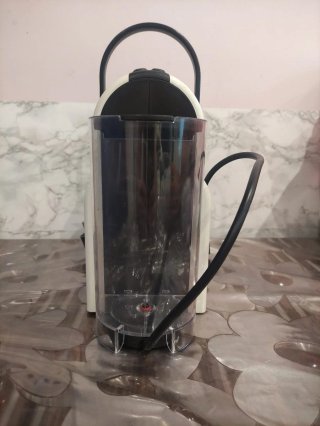 Cafetera Nespresso + Cajón Cápsulas