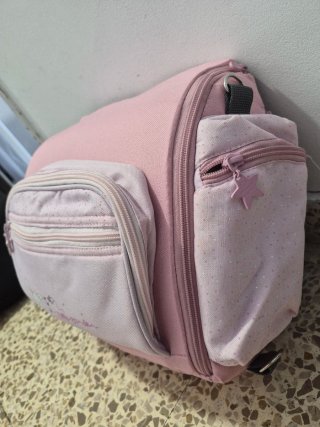 Trona de viaje rosa con estampado de topitos