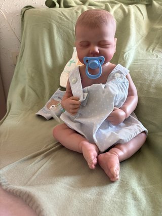 Bebé Reborn con accesorios