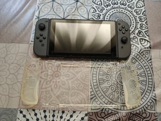 Nintendo Switch + Metroid Dread, grip, funda y SD