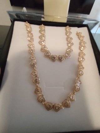 Conjunto collar y pulsera corazones dorados