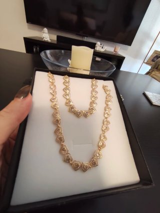Conjunto collar y pulsera corazones dorados