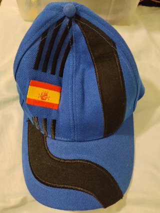 Gorra azul con bandera de España