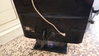 Ventilador Taurus Negro/Gris y televisión LG d 22p