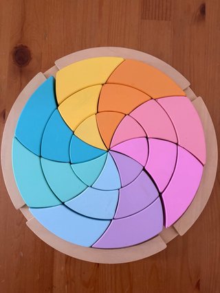 Puzzle de piezas circulares de colores