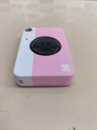 Pack Kodak Printomatic con papel, álbum y accesorios
