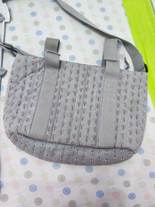 Bolso y colchoneta para carrito de bebé