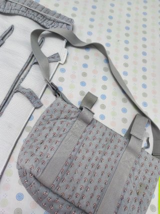 Bolso y colchoneta para carrito de bebé