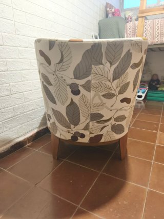 Butaca de tela con estampado floral