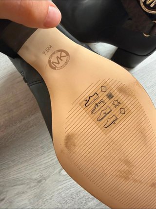 Botines Michael Kors Negros y Marrones