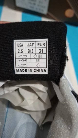 Sneakers bianche e nere Bambino Taglia 31