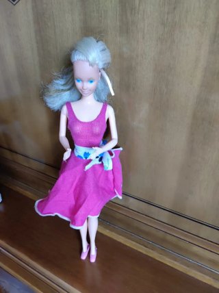 Traje de baño rosa y falda cruzada, bailarinas