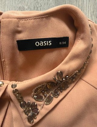 Vestido Oasis con cuello joya