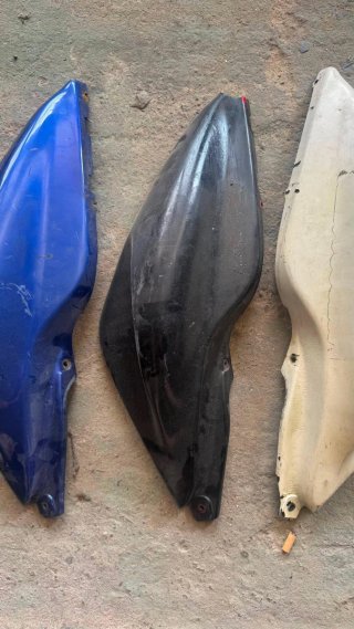 Plásticos laterales Aerox (Azul, Negro, Blanco)