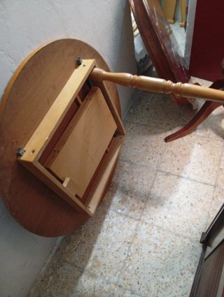 Mesa de comedor redonda de madera