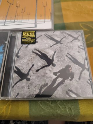 CDs Muse: Origin of Symmetry y Absolution
