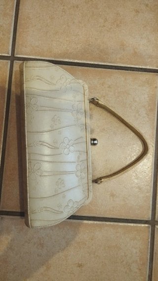 Bolso beige con flores