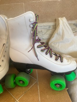 Patines 4 ruedas blancos T.38