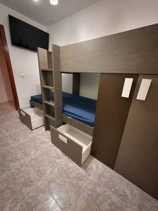 Dormitorio niño cama nido con armario y cajones