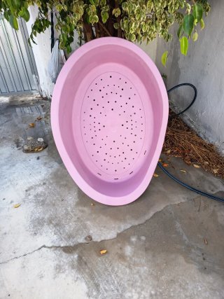 Cama para perro ovalada rosa