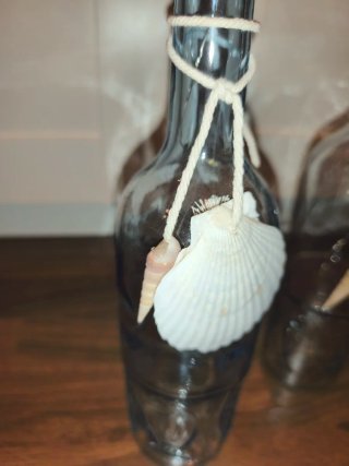 Botellas decorativas LED con conchas