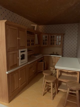 Casa de muñecas de madera