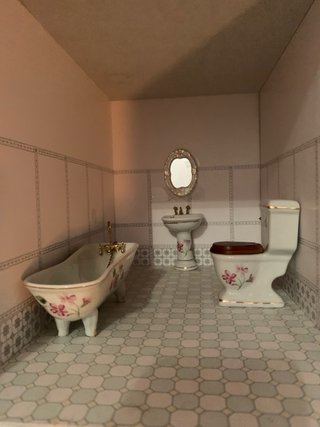 Casa de muñecas de madera