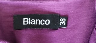 Vestido morado con volantes y cinturón
