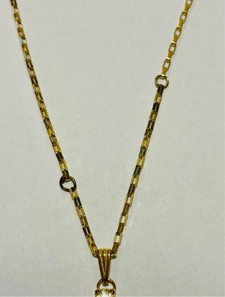 Collana vintage dorata con croce strass