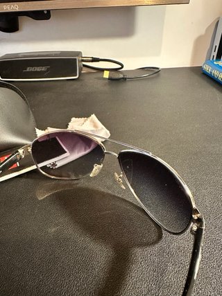 Gafas de sol Ray-Ban plateadas lente azul oscura