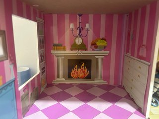 Casita de muñecas rosa
