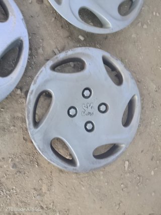 Tapacubos Peugeot 206 Originales (4 unidades)