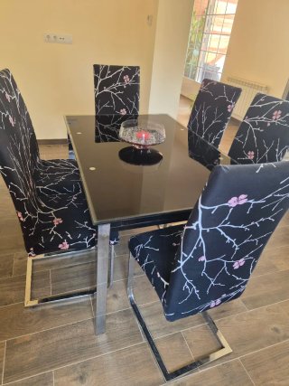 Mesa de cristal extensible con 6 sillas de regalo