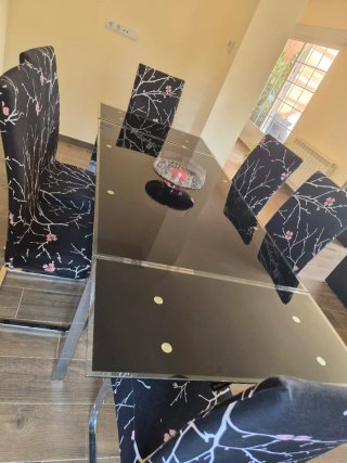 Mesa de cristal extensible con 6 sillas de regalo