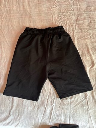 Conjunto EA7 negro y verde